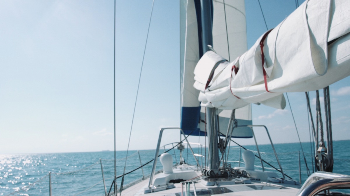 Sailboat mast and furled sail